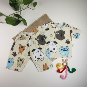 ست تیشرت و شلوارک نوزادی پسرانه آستین کوتاه برند پاپلی کیدز طرح سگ جلو بسته شیری رنگ