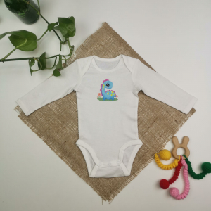 بادی نوزادی دخترانه آستین بلند برند h&m طرح دایناسور سفید رنگ