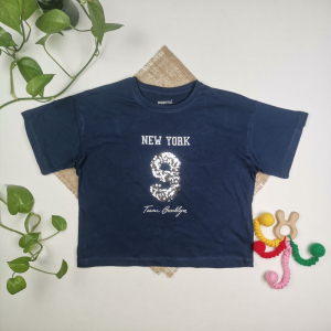 تیشرت کراپ نوزادی دخترانه آستین کوتاه برند pepperts طرح نوشته دار پولک دار سرمه ای رنگ