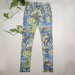 شلوار دخترانه طرح گل دار جیب نما بنفش رنگ - سایز 29