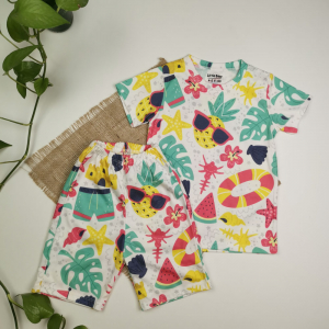 ست تیشرت و شلوارک دخترانه آستین کوتاه طرح استوایی سفید رنگ - 4-5 سال