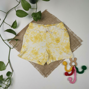 شلوارک نوزادی دخترانه برند cat & jack طرح ابر و باد جیبدار تو دورس زرد رنگ