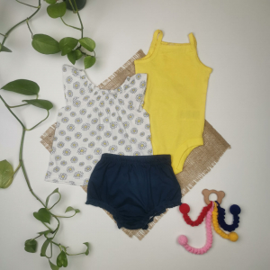 ست تاپ و شورتک نوزادی دخترانه آستین تاپ برند lupilu طرح بابونه سفید رنگ